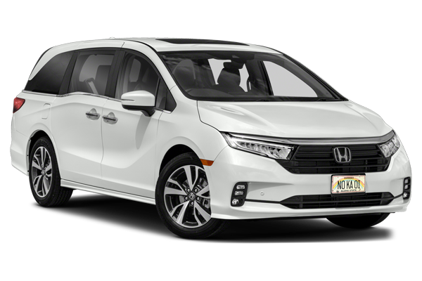 White minivan viewed from the front and side, featuring black and chrome accents, alloy wheels, and a "NO KA OI" license plate, ready for an adventure in Maui as part of an exclusive private tour.